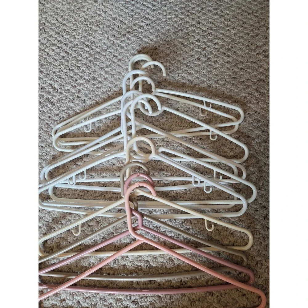 Bundle of Light Colored Hangers